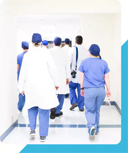 A medical team entering the hospital
